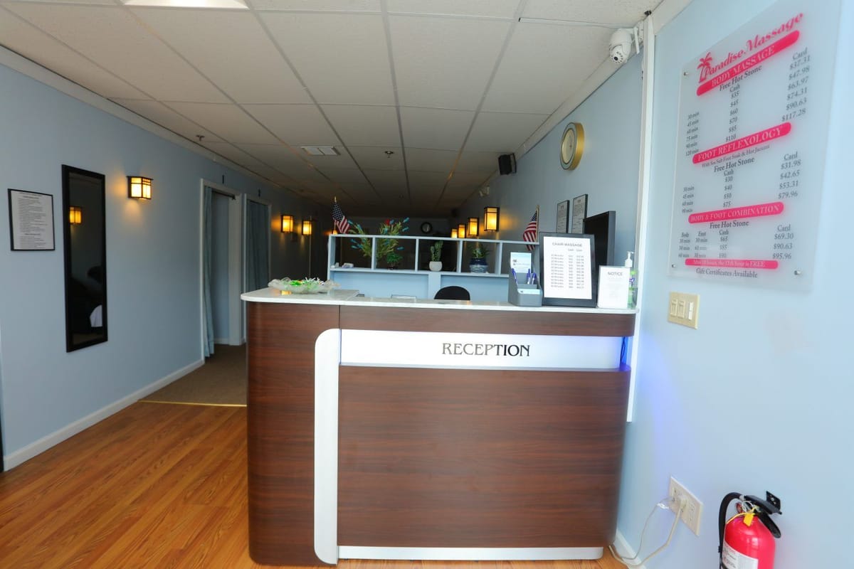 The modern and welcoming reception area at Paradise Massage in Matawan, NJ.
